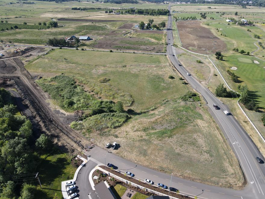 Prime development acreage in great location- East Medford.  Over 10 acres with building potential.  Zoned SFR-4 with possible zone change.  Nice location across from Centennial Golf Course and new homes. Easy access to freeway and main arterials.