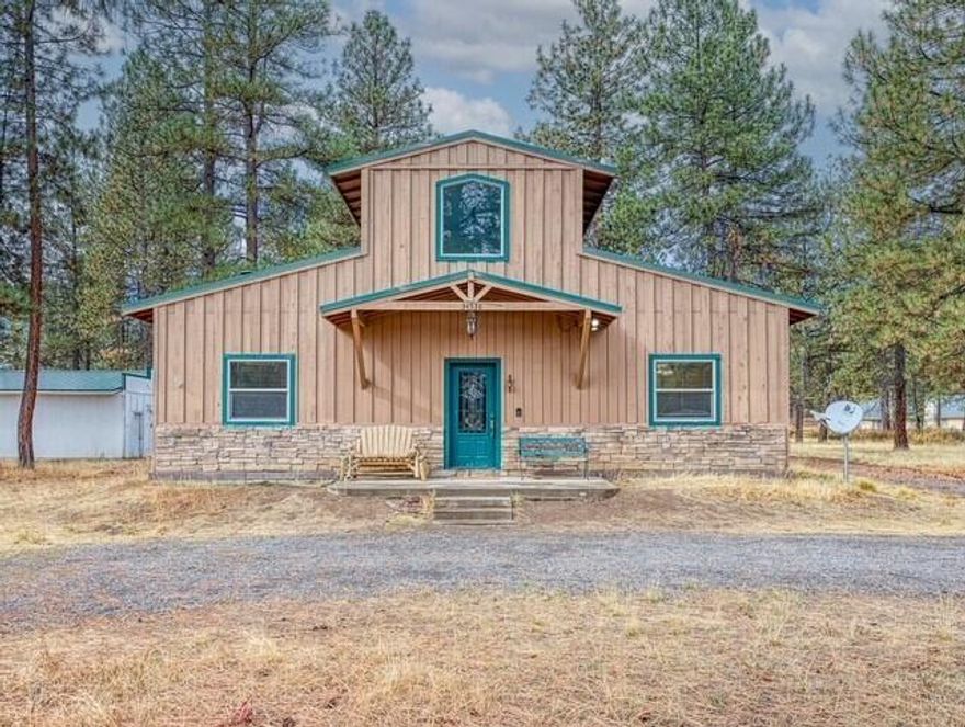 Turn key AirBNB!! This uniquely custom home is on 2 acres, and only about 20 minutes from the middle of Klamath Falls. Within minutes you can get to Klamath Lake, hiking, nearby rivers for fishing or kayaking, Crater Lake & more. The stunning turquoise cement floors & wood details set this home apart from the rest, making it an ideal investment property or that perfect place you've been looking for on the outskirts of town. There is an attached garage, detached 30x40' shop with cement floor, 120 & 220 electrical, and an RV hookup. This home could be sold furnished if buyer would like, call today to come see its one-of-a-kind features in person!