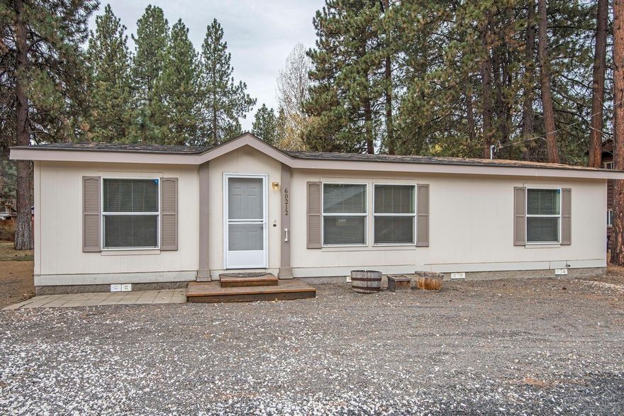 You can afford this! Cute, clean 2007 manufactured home is move-in ready! You'll like the spacious kitchen and dining area, large living room and big laundry/utility room. The master bedroom and bath are on the opposite side of the house from the two guest bedrooms and bath. Vaulted ceilings & big windows give you lots of light. The back yard has a nice grass yard and trees and is fenced. Unusual for this area, the .22 acre lot gives you elbow room without all the work of a bigger lot! This could be your next home!