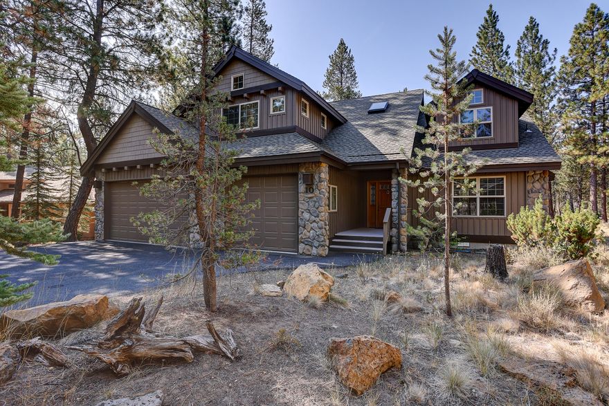 This Sunridge Construction lodge style home is a MUST SEE! Located on the North End of Sunriver and offers four spacious suites. Two suites on each level. The lower suite has a private access to hot tub enclosure. Log accents throughout this home give it that desirable Northwest look and feel. Vaulted ceilings, gas fireplace with river rock surround. Hardwood floors with an open kitchen that features newer stainless-steel appliances, newer quartz counters and eating bar. Wood blinds throughout. Bathrooms have slate/tile flooring and countertops. Wrap around deck with benches, drip system for planters and hot tub. Extra loft area that is perfect of a desk or reading area. Triple-car garage, smaller bay was converted for locked off storage. Roof replaced 2018. Furnace replaced in 2018 & A/C added in 2021.  Refrigerator 2021. SHARC Paid. Partially furnished. Don't MISS this one!