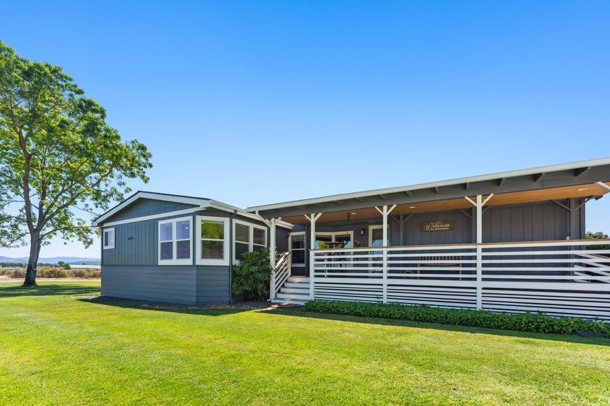 Turnkey equestrian property in Central Point with stunning views of Mt. McLoughlin & Table Rock! Enter this beautifully maintained 2.79ac property through a private gated driveway to find an 80'x90' riding arena with year round footing, 20'x40' barn with 2 stalls and attached runs, hay storage, hot and cold water, and full bathroom, four cross fenced turnouts with sprinklers and water spigots, and ample parking for horse trailers. An oversized & climate controlled 3-car garage/shop measuring 48'x24' provides extra storage or workspace. Plus a 65'x25' RV pad with full hookups. Enjoy immaculate landscaping with in-ground sprinklers and an outdoor kitchen under a charming gazebo—perfect for entertaining. The spacious 3 bed, 2 bath home features numerous updates, offering comfort and modern touches throughout. Whether you're an avid rider or simply seeking a move-in-ready rural retreat, this property is a rare find. Everything is in place for you and your horses—just bring your saddles