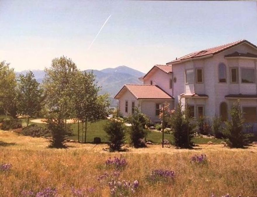 Beautiful 360 degree views from this wonderful property located at the end of Wilson Rd. on 45 acres. Enjoy the outdoor settings 365 days a year in this 2859 sq. foot 5 bedroom, 4 bath custom built home in the East hills of Ashland. Must see custom Marmoleum kitchen floor, Jenn-Air stovetop/oven,Mahogany cabinets, Wet bar,7 skylights ,Oak flooring w/ rosewood trim,Granite counter tops,kitchen food prep sink and custom chopping block,2 pantries,slate flooring,Rheostat lighting,dedicated high speed internet,living pond with large koi & turtles, that blooms every year with hundreds of yellow iris;veggie/herb garden with dedicated irrigation.Finished two car garage,Teak deck off Master, Custom Design 9 ft. working Sundial. Above the fog line and very private with gated road plus spectacular views of the valley, city of Ashland, mountains, Pilot Rock and Mt. Ashland await you.