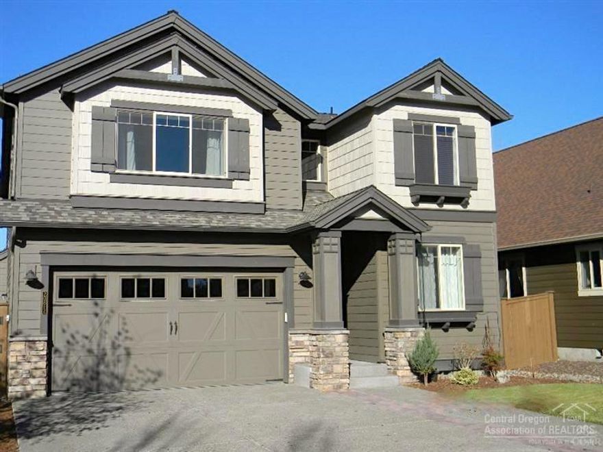 Something for everyone! Great room, 10' ceilings, huge bonus room, big picture windows. Past model home with extra features & designer touches! Slab granite, wood banister stair case, custom lighting & shelving. Even RV parking! A must see. Backs to green areas and canal!