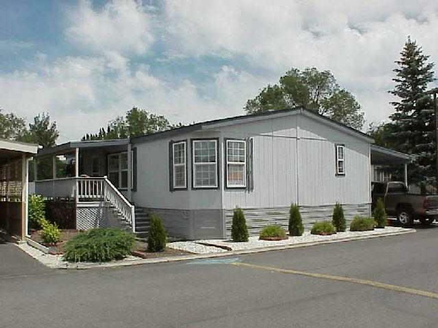 Lovely Home W/Nice Floor Plan Vaulted Ceilings Walking Closet,Extremely Will Kept. Large Car Port & Deck Fenced Yard Current Park Rent $265 A Mo. Park Pays Water & Trash. Very Economecial Ulitilies