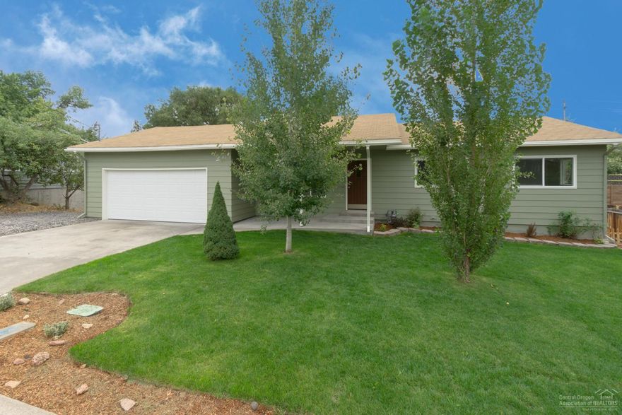 Better than new home has all NEW kitchen, flooring, paint, finishes, EVERYTHING! New Cherry cabinets w/Granite counters, decorative backsplash, durable Laminate wood flooring throughout living area. Plush carpet in the bedrooms & entire finished basement. New windows, interior doors, Gas Fireplace, fixtures. Lower level is an amazing bonus room or could be converted to an apartment. New landscaping w/auto sprinklers, fenced & ready to go! Room for RV & toys in a central location to amenities. Move in Ready!