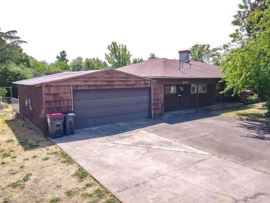 This 4 bedroom/ 2 bath home features 1340 sq ft of living space. Huge living room with fireplace. Kitchen has abundant counters and cabinets. There is a huge indoor laundry room. Appears to be original hardwood floors under the carpet. Nice covered back patio as well as a huge lot with room for a garden or park toys. All of this at the end of a cul-de-sac.