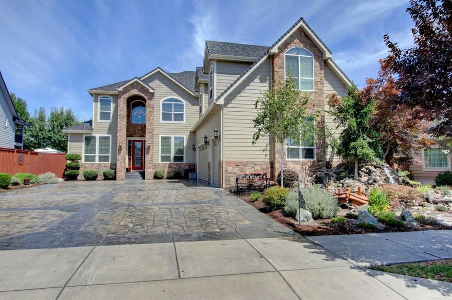 Exquisite Custom Built Home Located in Desirable Pheasant Creek Estates! A True Masterpiece * Must tour! 4145 sq ft main home PLUS 506 sq ft custom pool house (perfect 2nd guest quarters), gunite in-ground swimming pool w/slide, lights, built-in spa, waterfall & stamped concrete. 3 car garage w/custom cabinets & flooring. Stamped entry concrete driveway, 2 laundry rooms, theatre room w/sound proof walls, crown molding, crema marfil marble floors, upgraded carpet, lighting, & plumbing fixtures. Gourmet kitchen w/granite countertops & island w/custom hood vent, stainless steel appliances, lighted cabinets w/glass tops, can lights w/LED bulbs, Christmas tree timer/bulbs pre-hung, 2 gas fireplaces, incredible faux painted rooms, formal dining room, huge living room & family room, open floor plan, 2 offices, downstairs & upstairs master suites w/ his & hers walk in closets, on-demand hot water, central vac, outdoor kitchen & installed speakers, +more. Please tour this 1 of a kind home!