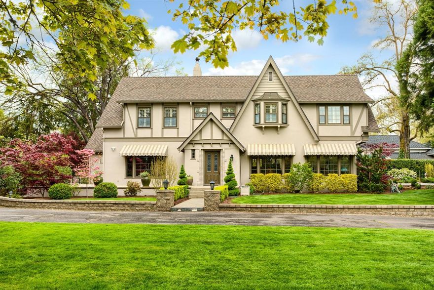 Grand East Medford Classic! Frank Clark designed home on over 3/4 of an acre with in ground pool and hot tub. The whole house has has been updated/re-modeled keeping the charm and style of the era. Mature manicured landscaping with driveway entry in front and back. Automated gates in front and back. 5 bedrooms plus office. Mater suite up and downstairs. 3 full baths all remodeled.Immaculate condition. One of a kind beautiful Home!