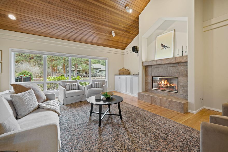 Nestled on a half-acre lot in the gated Mtn High community, this custom-built, single-level home offers a thoughtfully designed 4-bedroom (fourth could be an office), 3-bath layout, including two primary suites. The inviting great room features a vaulted cedar ceiling, built-ins, a gas fireplace, and abundant natural light. The kitchen boasts stainless steel appliances, a Thermador oven, and marble tile countertops. A spacious laundry room with a second oven next to a generous walk-in pantry adds convenience. The primary suite offers heated tile floors in the ensuite bath. Abundant built-in cabinets provide plenty of storage. Step outside to a large Trex deck with a built-in hot tub, perfect for entertaining and relaxation. The beautifully landscaped lot enhances the peaceful setting. Enjoy community amenities like a pool, pickleball & tennis courts. The oversized three-car garage offers ample storage. Don't miss this opportunity!