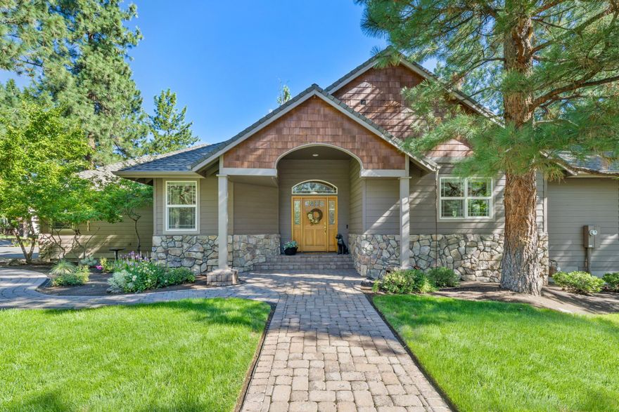 The Awbrey Glen neighborhood in Bend, Oregon has it all...tennis courts, walking paths, a playground and the option to obtain a membership for the golf course, pool, and fitness center, all in a gated community at the heart of Bend.
This spacious single level home features a large living/family room, newer hardwood floors, recently remodeled gas fireplace surround and mantle, a spacious kitchen with newer appliances, bright white cabinetry and granite counters. 
The dining room has brilliant wrap-around windows and access to the expansive deck. The third bedroom has been recently outfitted with custom desk space for the perfect work from home set-up. Both bathrooms have been remodeled, and the primary bathroom features a soaking tub with jets, a walk-in shower with a bench, two vanities, and a spacious walk in closet. The primary suite is large and also features direct access to the deck space. The three car garage is big enough for all of your vehicles and your Central Oregon toys.