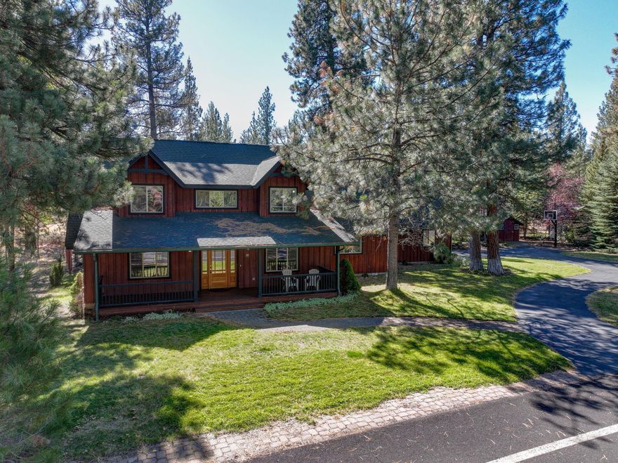 Stunning home ideally situated adjacent to National Forest land with direct access to Peterson Ridge Trail, where you can hike or bike  for miles. Only a few blocks from the charming City of Sisters, filled  with unique shops, dining, and community events. Expansive great  room with windows galore looking out at the surrounding forest with  a striking stone fireplace as its centerpiece. Covered front porch in  front and patio in back for enjoyment of the outdoors. Well appointed office on the main floor. Primary bedroom is also on the  main with three additional bedrooms upstairs and a versatile bonus  room/suite with its own bathroom. Homes with this type of special  location don't become available very often!