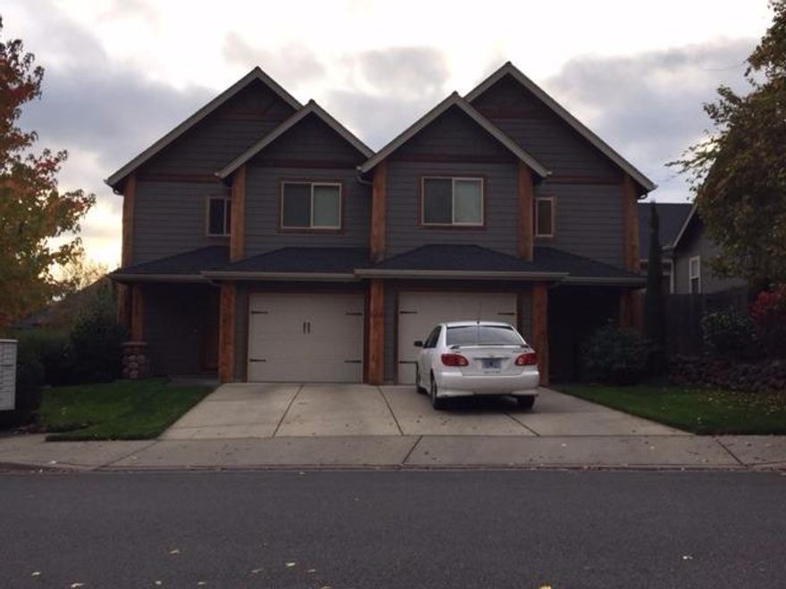 Prime Duplex Location Here's a great newer built duplex in a great NW Grants Pass neighborhood. Built in 2007 with unique log exterior log accents. Town house style with each unit featuring 2 bedrooms 2 baths, 1 car garage, and a total of 2602 sf. each unit rents for $795.00. Nicely manicured landscaping.