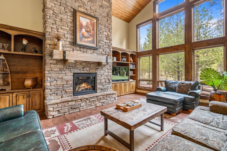 Beautiful Pineriver Homes built residence in Caldera Springs! This home is quality throughout, with high end finishes including gourmet kitchen w/ chiseled edge granite counters and faux finished copper ceiling, vaulted great room with wood ceilings and floor to ceiling stone/gas fireplace, wood windows/doors, hardwood floors, copper sinks throughout and upscale furniture package. Master on the main level, 2 additional suites, plus a bedroom/office. Bonus room with murphy bed upstairs with a full bath. Privately situated on a large lot with peaceful pine tree views. Outdoor living area with large paver patio, firepit and room for many activities. Strong rental history.