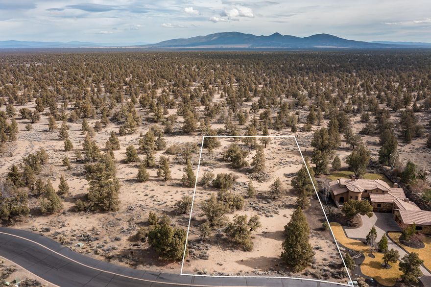 Backing to BLM, this almost an acre homesite in the Estates at Pronghorn at Juniper Preserve is in a convenient location just past the main gate with easy access to the exit and the neighborhood and resort amenities. Build your custom dream home or just take advantage of this offering to become a member of this exclusive golf community. Home site purchase includes a full membership to Pronghorn which features 36 holes of golf at two championship courses designed by Nicklaus and Fazio, Troon golf benefits, private members club, restaurants, on-site market, concierge services, day spa, pools, hot tubs, fitness center, staffed 24-hour gate, pickleball courts, dog park, trails and access to public lands. This is an incredible opportunity!