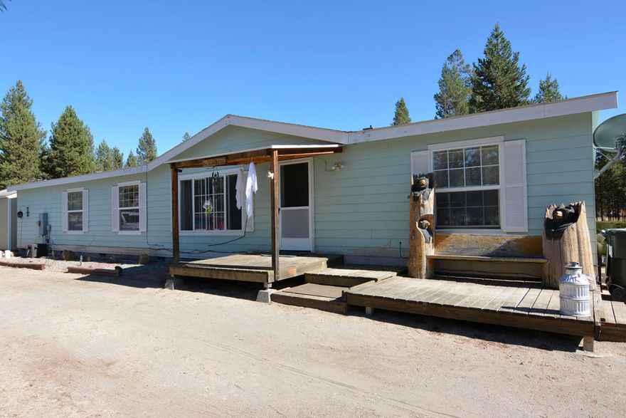 Located in Central Oregon just minutes to La Pine sets this 3 bedroom plus and office single level home with over 1780 SF setting on a level fenced 1 acre corner lot. Large open vaulted living room with lots of windows looking out to the trees. This home has a very large kitchen with oak cabinets, lots of counter space, large dining area, oversized master bedroom with a soaking tube and a shower. 2 other vaulted bedrooms. Double paned vinyl windows throughout. 2 Patios, sitting areas one oft front and one in the back fenced yard, raised flower beds, covered front porch, circular driveway, storage shed all for under $250,000.