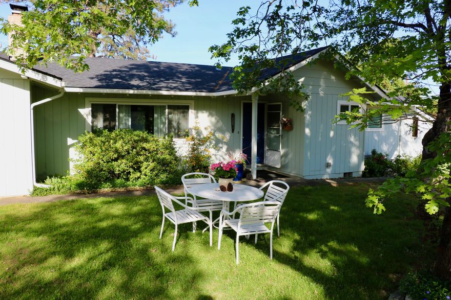 Country retreat only twelve minutes from historic Jacksonville! This thoughtfully updated home sits up & away from the road on nearly 3 lovely acres. There is plenty of room for gardening, enjoying a small hobby farm, potentially adding a workshop or all of the above! Beautiful new deck where you can catch a glimpse of Mt. McLaughlin and watch the wildlife. Recent improvements include New Roof 2024, updated bathrooms, new flooring in most of living area & bedrooms, new blinds, new dishwasher, new hot water heater, fresh paint inside & out and a new pump installed on a second well! Front room has a fireplace perfect for relaxing. Light & bright kitchen opens to family room w/ wood floors, a pellet stove plus a wall of windows through which natural light abounds. Don't miss the walk in pantry for extra storage. Three quiet bedrooms have updated windows, the primary bedroom has en suite bathroom & access to a sunroom perfect for an artist space or indoor plants.