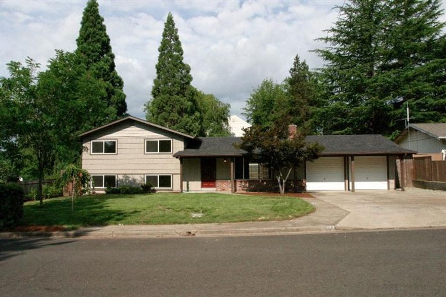 This newly renovated house in East Medford features a new roof, gutters, new PEX plumbing, new siding on most of the house, new electrical panel, new paint inside and out and new floor coverings with permits on file with city. It also boasts a new kitchen with Staron countertops complete with stainless appliances. Four bedrooms in this split level house allow ample room for a home office or extra bedroom. The certified woodstove allows cozy warmth for those cold Southern Oregon nights. Enjoy an additional family room in the daylight basement. This house is move in ready and can be a suburban homestead, complete with raised beds and a chicken coop. In addition to new garage doors, the garage also features an additional garage door along the back wall allowing drive through access to the backyard. This home is located less than a mile from Hoover elementary and close to Rogue Regional Medical Center. Seller is a licensed agent in the State of Oregon.