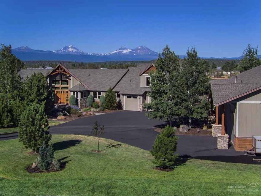 Eleven Peaks Ranch - Panoramic Cascade Mountain Views! Absolutely stunning home offering single level living with a bonus room over the garage. Vaulted great room featuring a stacked stone propane fireplace & floor-to-ceiling windows to enjoy the spectacular mountain view. Spacious kitchen and glorious master suite. Beautifully manicured yard with a babbling brook and a pond. 3,456 sf shop with lots of room for projects and still park the vehicles & toys. 28.11 acres with 19.92 acres of Tumalo irrigation.