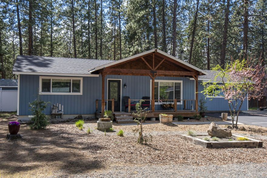 Retreat to the peace & quiet of Deschutes River Woods, where country living meets close-in convenience. Over an acre of beautifully landscaped oasis surround this single level home and multiple outbuildings. Entertain on the covered back patio to the sounds of the water feature; lay back in hammocks strung up by the above ground pool; or prepare a drink at the outdoor bar then relax into the hot tub. A garden area & freshly planted fruit trees is the backdrop for this pristine backyard, w/ a separate mother-in-law suite, complete w/ kitchenette & full bath, nestled in between. An 1100sqft shop sits just off the pull through drive, w/ two built-in office spaces & ample storage. Tucked behind the shop is the perfect RV storage spot w/ 220 power hook-up. The single level main house has been freshly renovated, its great room floor plan flows nicely through the living room, dining area & beautiful kitchen w/ new high-end appliances. This one-of-a-kind property, you will not want to miss!