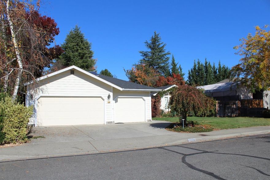 Wow! What are you waiting for? Come see this incredibly spacious home, located in the desirable Rogue Willow Estates neighborhood. This home offers 2235 Sq. Ft. with 4 bedrooms, 2 baths and a second living room/family room. There is Rogue River access directly across the street, down a dedicated walking path with a nice picnic area. With wonderful views and a short jot to Reinhardt park, you just can't go wrong! This home boasts class and character throughout with a huge three car garage, vaulted ceilings, tile countertops, and large windows to see all the beautiful views. All information is deemed reliable, but not verified and subject to change without notice. Buyer to do their own due diligence.