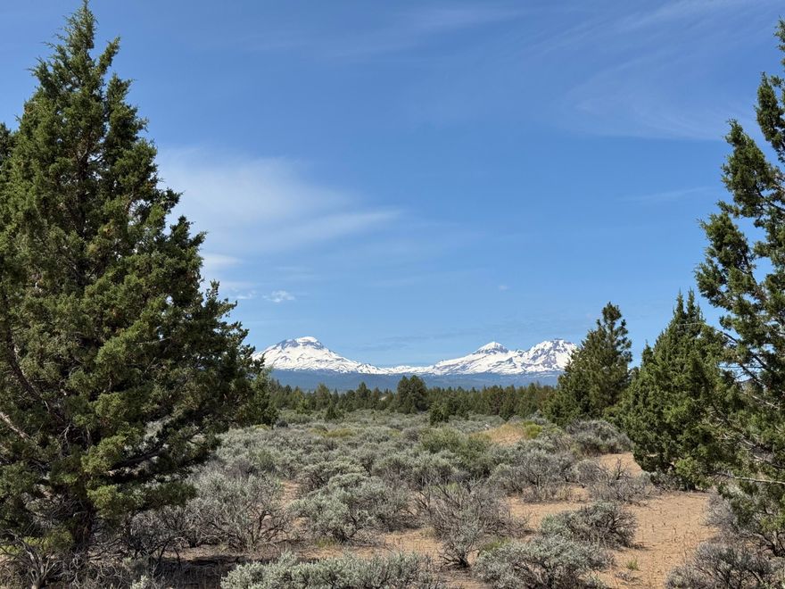 Incredible opportunity to own 10.56 acres in the desirable Sisters School District! This private,
natural high desert setting features stunning Cascade Mountain views, an existing well, and room to roam. BLM is across the gravel road. Other Improvements include a shop/garage and a charming vacation cabin—perfect for weekend getaways. This spectacular recreational area invites you to fish, ski, hike, bike, and horseback ride! Enjoy plenty of space to create your dream  estate. A rare blend of privacy, views, and potential!