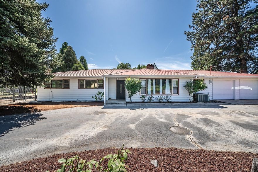 Located in the highly desirable Neidermyer subdivision this beautiful home is a 3 mile country drive from Jacksonville. You enter the property through a circular asphalt driveway surrounded by gorgeous old growth trees and roses. Lightly remodeled in 2018, this home rests on a 0.88 fenced acre and offers 3 bedroom, 1.5 bath, 2 car attached garage, an in-ground swimming pool with large deck, raised garden beds and more; which would make for the perfect outdoor entertainment space!