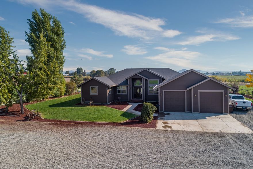 Unique McKay Creek frontage small acreage property with gorgeous 2800 sq ft custom built home tucked off the Prineville/Madras Hwy. Extremely private and quiet setting. Vaulted ceilings throughout to give that extra spacious feeling. Extra large master bedroom with large bathroom and walk-in closet. Huge kitchen with island open to the breakfast nook and great room. Beautiful back yard with fully covered trex deck, great for entertaining. 26+ irrigated acres that produced 65 tons of hay this summer. Hay storage building with 4 stalls attached. Nice 40x48 detached shop with 220 v and an oversized 2 car garage attached to the house. Come enjoy all Central Oregon has to offer!