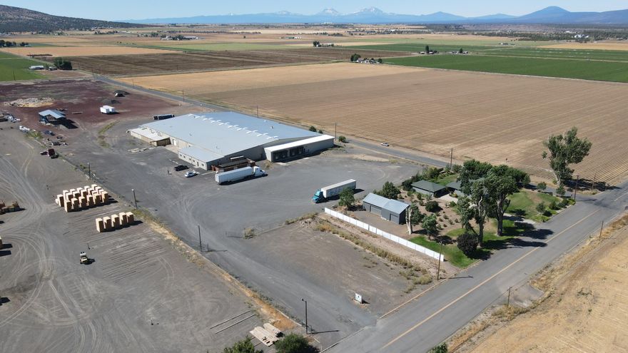 NET LEASED INVESTMENT WITH 6.50% CAP RATE! NOI: $412,800/ANNUAL ($34,400/month) & 3% annual escalations. Leased to DS Services of America/Primo Water. Lease expiration 6/20/2029. 100% NNN Triple Net lease. Leased to $1Billion gold plated company one of North Americas largest bottled water companies. Extraordinary facility upgraded in 2015 & 2021, fully sprinkled warehouse, offices and breakroom, wet fire suppression system, 480 volt, 3-phase power rated for 1,000 amps, 4 dock-high enclosed bays, multiple man doors, restrooms separated for warehouse/office employees, free span is 100' x 300', clear height 14' at eve and 17.5'at inside of roof , inside height to the roof is 19'. Lighting was upgraded with Energy Trust of Or T-8 bulb dormers w/motion sensors, quality control rooms, corporate offices, executive office, pre-engineered steel building, dock-highs have auto levelers and PVC Dock Seals-Just 18 miles north of Redmond, OR. 66,000+/- SF Industrial complex with 6.8+/- Acres!