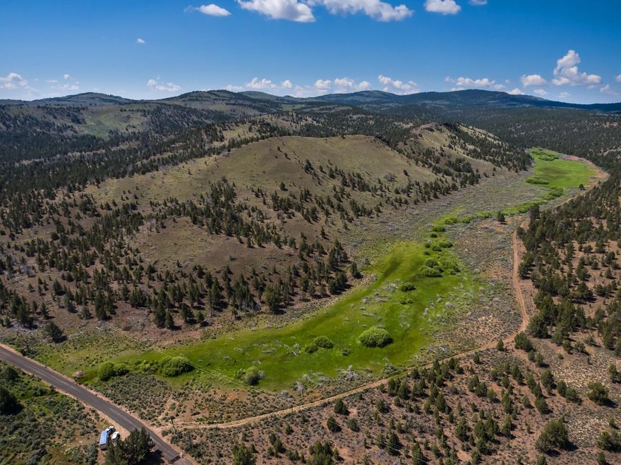 Clover Creek Ranch is wonderful opportunity for livestock grazing, hunting and high desert recreation. The ranch is 9976.5 acres,
19,095 +/- acres of leased BLM Allotments with 1637+/- AUMS and 293 acres of seasonal water rights in the meadows. The topography is a combination of forest, juniper rangeland, timbered draws, rimrocks, meadows, springs, numerous spring fed creeks and Clover Creek. The ranch has an abundance of wildlife including mule deer, elk, birds, and cougars. The property is fenced, cross fenced, has developed springs, water lines for livestock watering tanks and a good road system. Approximately 1 hour from Bend and Prineville.