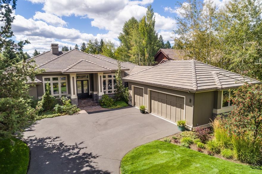 Casual elegance meets contemporary in this desirable SINGLE level home in the gated golf community of Broken Top. Overlooking a picturesque lake & 17th green this stunning home features an open floor plan with an impressive great room with large windows, gas fireplace, built-ins, and coffered ceilings. Lovely accents throughout including travertine entry, custom cherry china cabinets and beech hardwood floors. Enjoy hosting family and friends in the formal dining room or having a cup of coffee in the morning in the light filled breakfast room with a golf course view. The spacious & luxurious master suite, nicely separated from 2 en-suite guest rooms, boasts an extra large closet and bathroom with a soaking tub and offers a tranquil, welcome retreat. With a roomy den/office, 3-car garage w/ plenty of storage and a covered back deck & paver patio to relax or entertain, you will find that this home checks all the boxes!