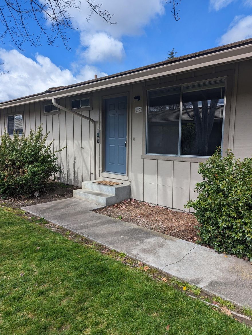 This charming condo is located in the highly sought after Heritage Village. This is a rare opportunity to own a single level unit with 2 bedrooms and 2 full baths located in historic Jacksonville.  This condo is close to the Britt Festival and downtown.  It features 984 square feet, a kitchen that has been updated with new stainless steel appliances including the refrigerator, living room, dining area, primary bedroom with large closet and bath, the other bathroom has a tub and shower, a slider to the patio with small fenced yard, Condo has been recently painted and new flooring thru out  This Unit has a covered carport with storage area and each unit has another parking place on the property they can use but it is First come - First Serve, per HOA President.  HOA dues are $165.00 per month which includes exterior maintenance, landscaping of common areas, and trash service. Please call for your private showing!