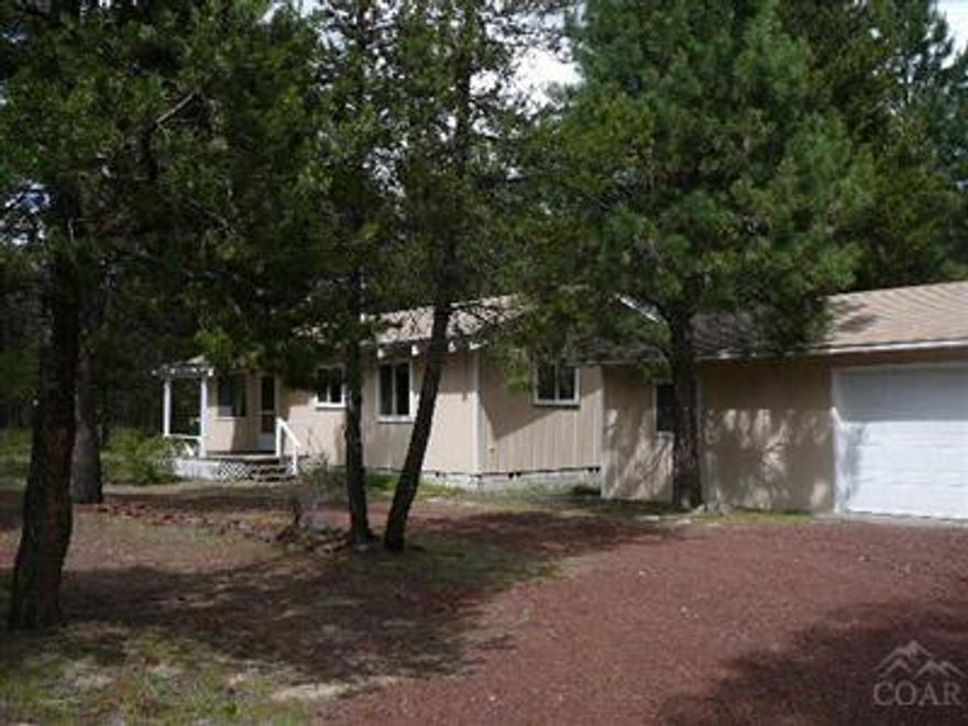 Peaceful setting on 4.75 acres for you & your horses! Loved and meticulously maintained by one owner for over 18 years! Fenced and crossed fenced, barn w/hay & firewood storage, plenty of room for toys & RV's 2 single car det. Garages, additional approx. 13x9 heated guest or craft room (not incl. in sq. footage.) Beautiful knotty pine interior, berber carpet, NEAT AS A Pin!! Perfect vacation retreat not too far outside Lapine!