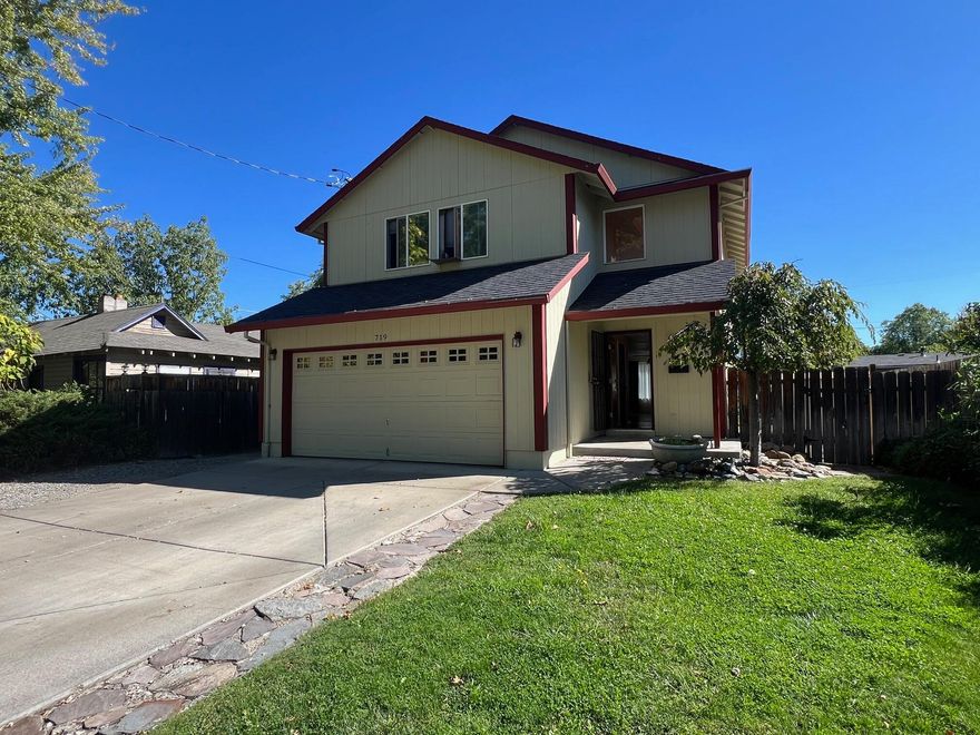 Start the New Year in this beautiful home located in an old, established neighborhood, close to parks, shopping, schools, wineries and everything Southern OR has to offer! Your main living area downstairs is warm and inviting w/bamboo floors, open concept living room, dining area and kitchen w/granite counters, tile backsplash, pantry & breakfast bar. A slider leads you to the covered patio and spacious backyard w/alley access and pond feature making possibilities endless from extra toy storage to a pool or amazing gardening opportunities! Upstairs the wide hallway leads to additional bedrooms, full bathroom, walk in storage closet and massive ensuite Primary w/3 full size closets! The property also features plenty of extras including 30' RV parking w/ h/u and 2 cleanouts, inside laundry, addt'l ½ bath downstairs, in ground sprinkles, drip system, finished 2 car garage, and vinyl windows! The finishing touches for the holidays are just waiting for you!