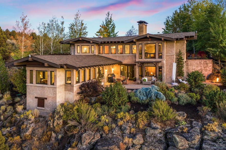 Tuscan Deschutes River Ranch oasis with spectacular river/mountain panoramic views! Relax on the back patio in front of your fire-pit, stargazing enjoying a glass of wine! Highly sought after private neighborhood! Stunning architecture with the prefect layout, light and design! Windows in every direction you look, grand entry with archways, exposed beams, travertine flooring, formal living and dining. Chef's dream kitchen with butlers pantry, wolf gas stove, multiple fridges, dishwashers, sinks, oversized island with bar seating, eating nook, & multiple deck/patios perfect for entertaining. Master wing with custom en-suite, WIC & spacious bath! Separate basement entry, bonus rm with tons of room to roam, play and much more! Bedrooms with attached bath and access to the outdoors. Dual climate control with heat pump and Central Vac. Views of the Sisters Mountain range, access to waterfalls and hiking trails, and a quick drive to Bend!