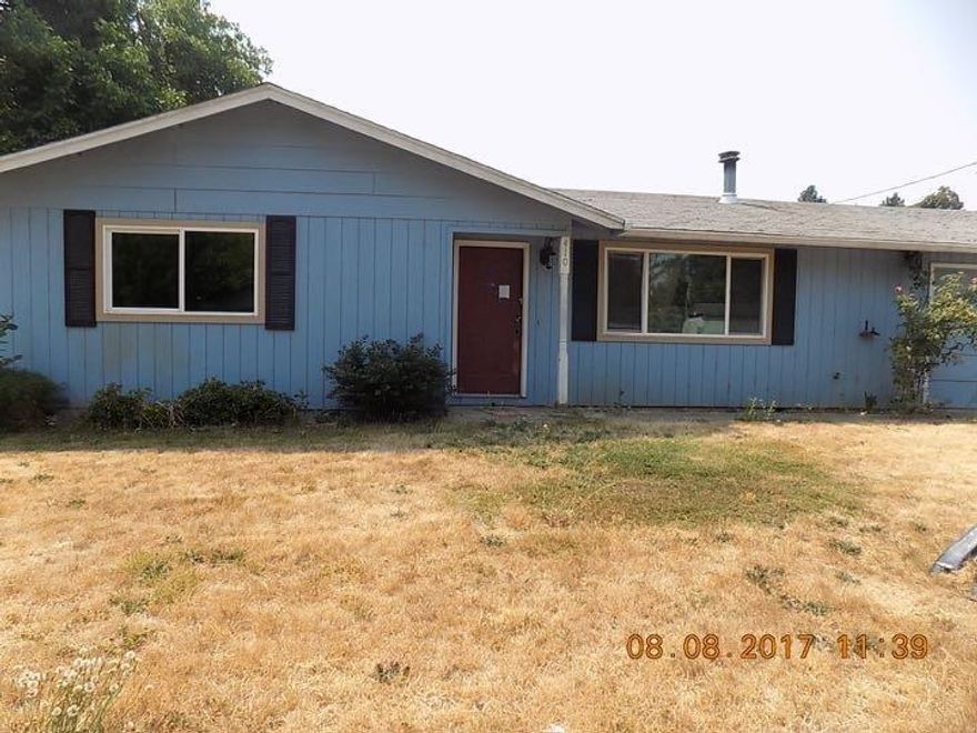 This is a diamond in the rough! Great neighborhood sitting on a very quiet street near shopping and schools with a nice back yard. The home has been vacant for a while but the bones are great and it shouldn't take much to bring it back to a wonderful home and at this price you won't mind.