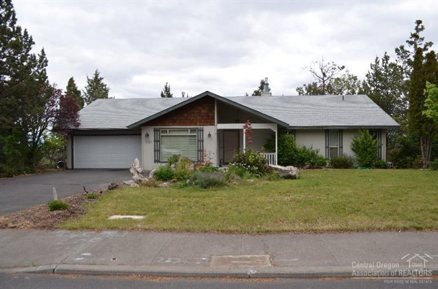 Location! Location! Location! with an awesome easterly view! Large lot, all on one level, nice size bedrooms, gas fireplace in the living room and the master bedroom. Home has tons of potential. Close to schools, shopping and medical.