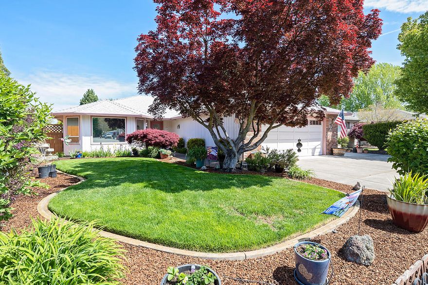 This immaculate home is in pristine condition.  Featuring over 1600 sq. ft of living space, three bedrooms and bathrooms.  As you walk in you will notice the myrtle wood hardwood floors, huge living room with natural light flowing in.  Recessed lighting provides the perfect ambiance.  The kitchen has granite counter tops with hickory cabinets and slide outs.  There is an undermount kitchen sink. Plenty of cabinets and counter space as well as a breakfast bar and eating area.  There are three large bedrooms with the master bedroom having a walk in closet and beautiful bathroom.  Both bathrooms have custom tile work.  This home features gas heat and gas water heater new in 2022..  Outside you will find a covered patio, hot tub in a gazebo and perfectly manicured lawns.  In 2021 leaf guards were installed in the gutters.  This home shows the pride of ownership.