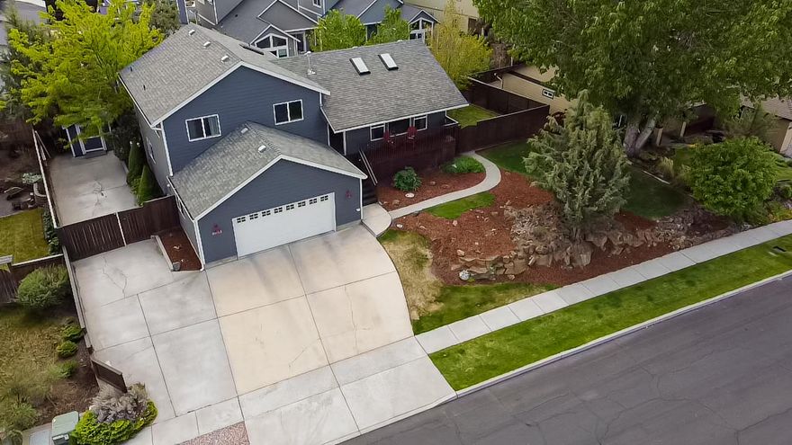 Wonderful split-level home within walking distance of Sky View and Lava Ridge schools. Quiet neighborhood close to shopping, schools, and the parkway. 3 bedrooms and 2 bathrooms are upstairs. The kitchen, dining, and living rooms on the mid-level, and a second living space, laundry room, and 3rd bathroom downstairs. Skylights bring in tons of natural light. In the garage, there is a workbench, sink, and door to access huge space underneath the home which can be used for storage. Corian countertops installed less than 2 years ago. Hot tub hookups in the backyard, RV parking, new stain on the decks. Take the virtual tour, and then come see this perfect family home!
Listing agent related to seller.