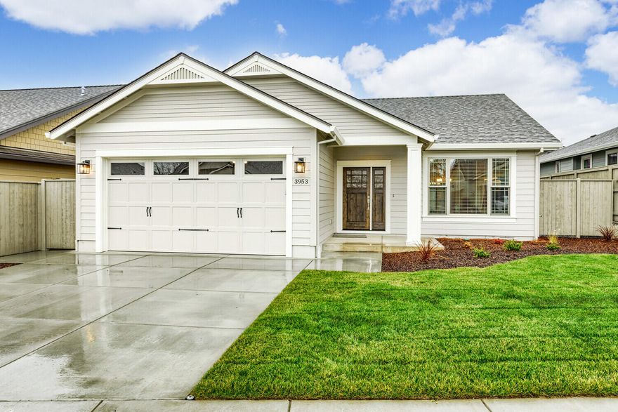 New Craftsman style home with great curb appeal.  Custom cabinets.  Quartz counters in kitchen and bathrooms.  Beautiful tile floors and showers in bathrooms and laundry.  Hardwood floors throughout the main living areas.  Spacious great room with vaulted ceilings and gas fireplace.  Primary suite with walk-in closet, dual vanity, walk-in shower and exterior door to patio.  Large backyard patio area.  Fully fenced and landscaped.  Refrigerator and window coverings are included.  Hardie Plank exterior siding and Milgard windows.  30 year composition roof.  Whirlpool gold series appliances.  Tankless water heater with continuous heating loop. Fully wood trimmed windows and baseboards throughout.  Earth Advantage certified for energy savings.