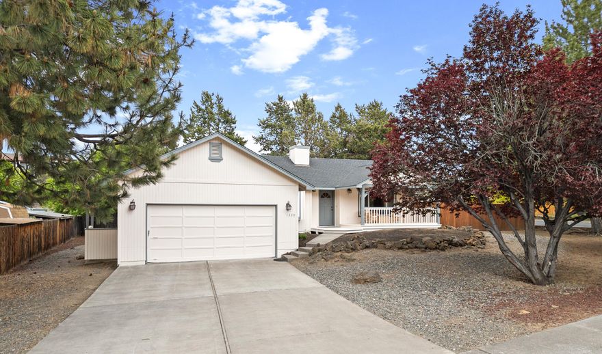 NE Bend SINGLE LEVEL on .25 acre RM ZONED corner lot.  Updated kitchen with slab granite counters, down-draft range and breakfast bar.  Light and bright great room and dining area with vaulted ceilings. Pergo floors throughout main living spaces. Cozy sunroom with French doors. Large primary bedroom and bath with walk-in closet.   Dining room could be used as a 3rd bedroom or office (a wall could be added and there is a closet).  Covered front porch, large back deck and fenced backyard. New heater was installed in 2022. Exterior of the home was painted May of 2025. No HOA. Close to St Charles Hospital and shopping.