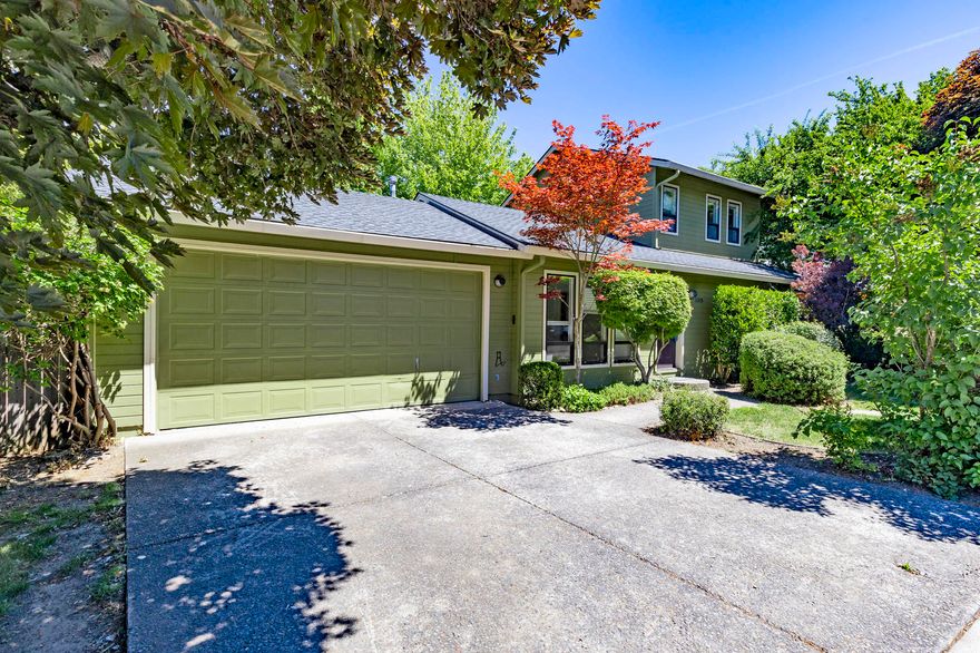 This home is located in one of the best neighborhoods in Ashland! The home is near schools, SOU, bike paths, Garfield Park, and of course downtown Ashland and the Plaza. Home offers vaulted ceilings, skylights, and southern exposure. The second floor master suite is a perfect get-a-way. Spacious with vaulted ceiling that opens out onto a private deck with valley views. Master bath offers a step in shower, double vanities and a walk in closest. The other 2 bedrooms are located on the main floor. The back yard is ready for some new gardens or a lawn. Don't miss out on this home at an attractive price!