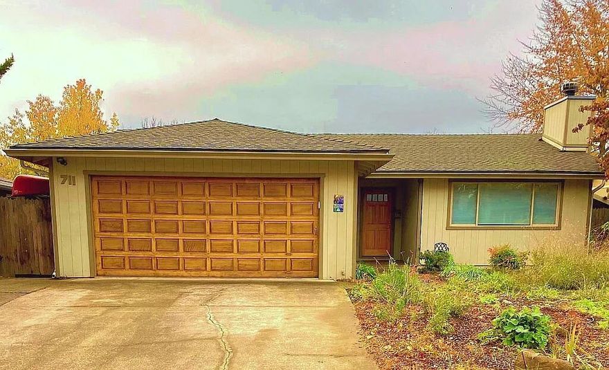 Gardener's Dream. Beautifully remodeled home in a quiet Phoenix neighborhood. Extensive work has been done both indoors and out to make this home both functional and stylish. Outdoors you will find a low maintenance, drought tolerant, pollinator front garden, a covered rear patio great for grilling, a recently installed paver path and patio, covered side yard for storage, raised garden beds, extensive flower beds, mature raspberry and blueberry plantings, established fruit trees, and an automated drip irrigation system. Interior renovations include: custom tile work in kitchen and baths, colored concrete hearth and bench seat around the wood burning fireplace, updated heat pump and duct work, craftsman style trim, vaulted living room ceiling, floating bookshelves, built-in dressers in closets, easy care bamboo and laminate flooring throughout. Home comes with window shades and updated refrigerator and stove.