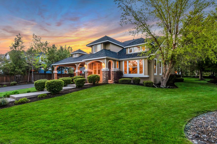 This lovely home in the Parks at Broken Top sits on a corner lot directly across from a large park in a quiet section of the neighborhood.  Slightly elevated, the setting provides privacy and morning light from the SE orientation.  Inside, the four square floor plan has an updated kitchen, hardwood floors and seamless indoor / outdoor living.  The upstairs on the main section of the home has the primary suite, two additional bedrooms + shared bathroom.  There is a versatile bonus room + full bathroom suite above the garage that is currently permitted as an AirBnB. This space can easily flex as a 4th bedroom, guest room, home office or playroom.  One of the larger flat yards in the Parks, the backyard has a spacious entertaining area.  A paver patio can be accessed off the great room with a covered area, gas fire pit and hot tub.  Attached two car garage with extra parking on the long driveway.  An ideal launching point to trails, schools, The Old Mill, Mt. Bachelor & the High Lakes.