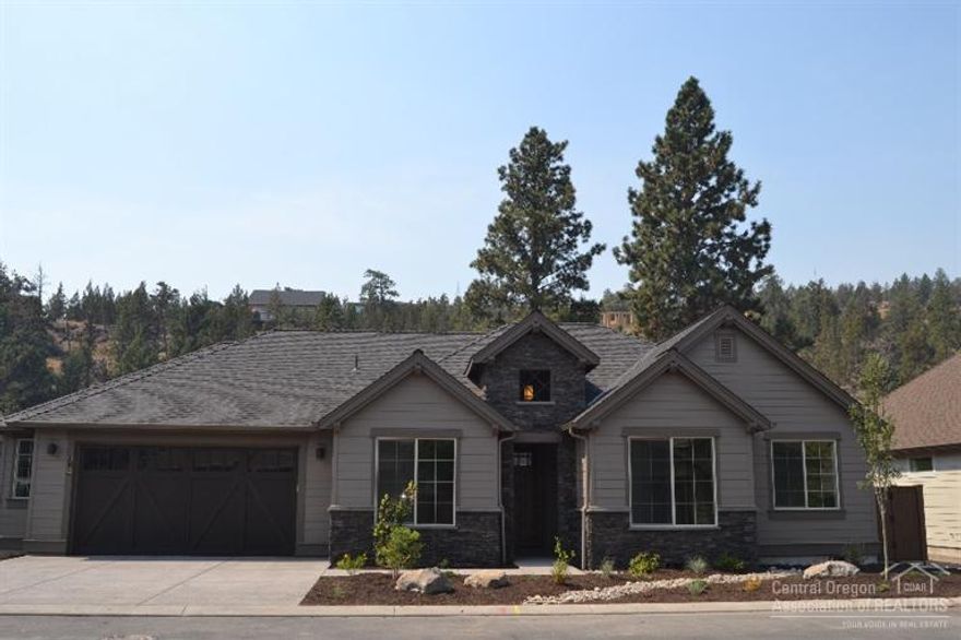 Enjoy a gated community next to the River Trail. Pahlisch homes SAHALIE plan is a one-level 4bdrm 2.5ba. Features a two car garage with additional storage area. Luxury finishes including quartz counters, engineered hardwoods, SS appliances.
