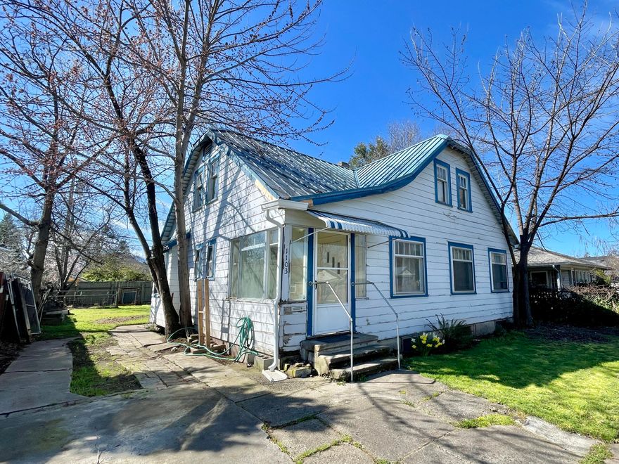 Owner may carry- inquire for more info!--So much potential here! This 4 bed 1 bath home is ready for someone with the skills to restore it to its former glory.it features 2 bedrooms per floor, and a partial basement below. Take note of the metal roof, gas central heating, red oak and fir floors, fenced back yard, old fashion sleeping porch, and room to park a vehicle off-street. Call for more info!