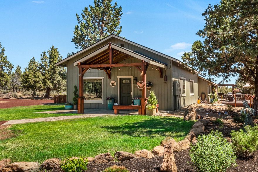 Escape to your own private retreat on 10.36 acres of pristine land, nestled among mature trees and backing thousands of acres of untouched BLM land. This beautifully updated 2,408 sq ft single-level home offers 3 spacious bedrooms, 2.5 baths, and a seamless blend of modern comfort and rustic charm. Enjoy peaceful mornings on the back deck, taking in sweeping views and abundant wildlife. Perfect for equestrians, the property is fully fenced and cross-fenced, complete with a 60'x120' riding arena, a round pen and room to roam. Thoughtful landscaping enhances the natural beauty, creating an idyllic setting for country living with endless recreational opportunities right out your back door. To add even more value, the property comes with two separate lots—you can build, sell, or keep it for privacy!