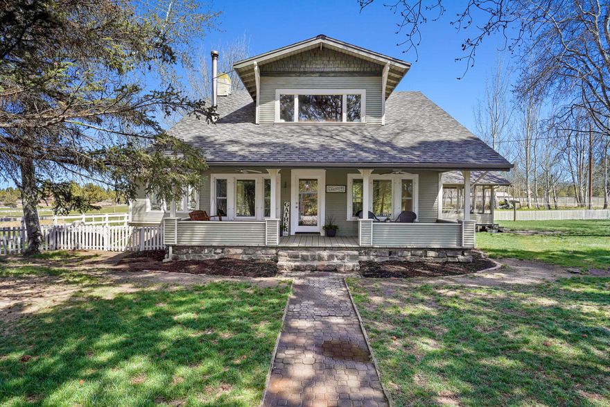 Welcome to this historic 1920's farmhouse, located in SE Bend. This beautifully restored home is 2-story, 3808 sq. ft. and includes a full basement & living quarters with it's own private entrance. The wonderful home has upgrades throughout including a new wood stove, new pellet stove, new windows/doors, new septic but still maintains the charm of old with big living spaces and plenty of room for entertaining both inside and out. Sit back and enjoy the serene setting on the partially enclosed back porch that overlooks your own private pond and antique greenhouse. This property includes all irrigation equipment on site. 17 acres of the 22 acres has Arnold Irrigation.  And talk about historic charm, you will also find the original potato house plus a 1984 sq. ft., 100 year old barn with original wood planking floor with full loft.