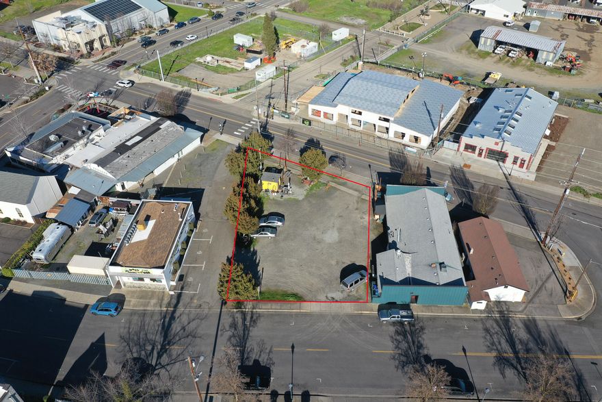 Two tax lots in the heart of Talent just across the street from the new Talent Maker City Building. Street frontage on two sides and alley frontage on the third side. The property is zoned Central Business District allowing for many uses and does allow for residential uses on a second floor. These are fantastic lots and it is an exciting time to develop of Talent.