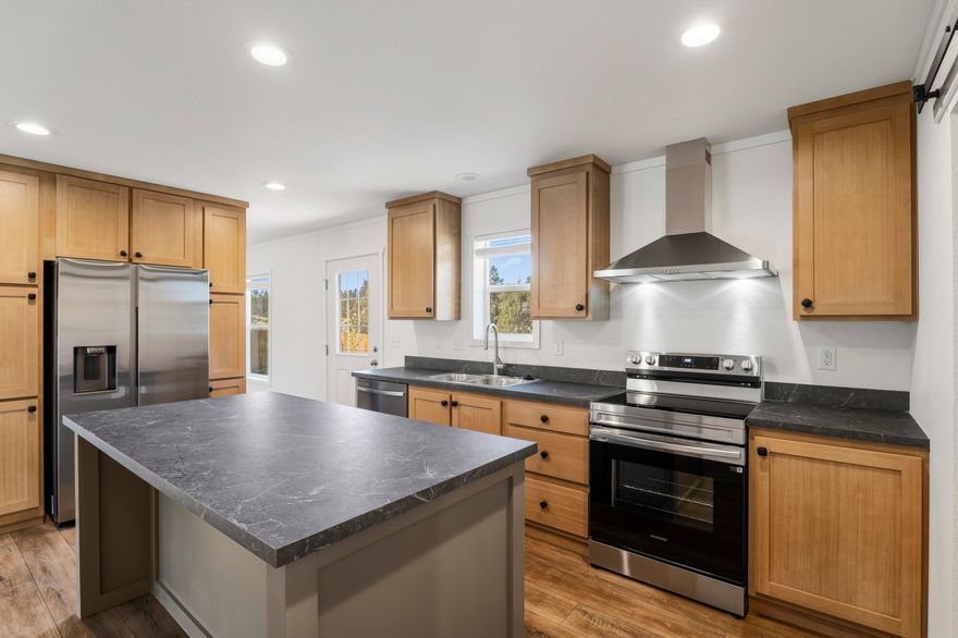 Brand New & Move-In Ready! Be the first to call this 2025 Marlette home your own. This 3 bed, 2 bath gem sits on a 0.21-acre lot, fully connected to utilities and fenced on three sides. Perfect for pets, play, or privacy. Functional layout with the spacious primary en-suite on the south side and two bedrooms tucked away on the north. Open kitchen with hardwood cabinets & stainless steel appliances. 

Plenty of space to park your RV, boat, or toys. No HOA.

Located in Madras, a growing Central Oregon city with small-town charm and big-time fun. Explore the new Initiative Brewery, Aquatic Center, bowling alley, cinema, food trucks, farmers markets, Jefferson County Fair and Rodeo, Madras Speedway, and the iconic Airshow of the Cascades. 11 miles to Lake Simtustus and 22 miles to Smith Rock. 

Affordable, fresh, and full of potential.