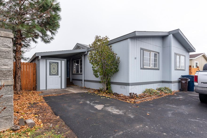 Completely remodeled and retouched single level home on a corner lot w/a small shop, storage shed, and great backyard. This home features a great room design, large living room, a breakfast bar, new acrylic countertops, and has been fully repainted inside and out. The home has newer laminate flooring through the high traffic areas and in one bedroom. The kitchen is spacious, has several built-in areas, a nice dining area, and comes equipped with a full complement of stainless-steel kitchen appliances. The living room has a great built in entertainment center with flat panel wall mount. Vaulted ceilings and a primary separation layout give this home an ideal layout. The primary bedroom has a walk-in closet and a large fully remodeled bathroom. The guest bedrooms are both spacious and share a nicely redone guest bathroom. The back yard is fully landscaped and features expansive raised planter beds, a large wooden deck, a storage shed, and a separately enclosed and graveled dog run.